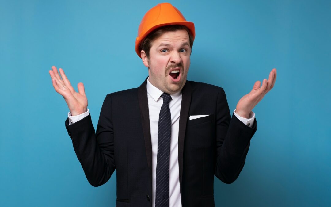 Caucasian young man in orange protective helmet asking what feeling upset